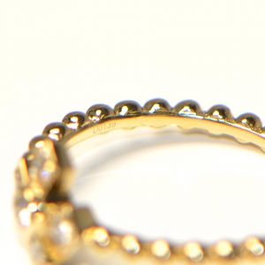 Diamantring Kreuz Gelbgold